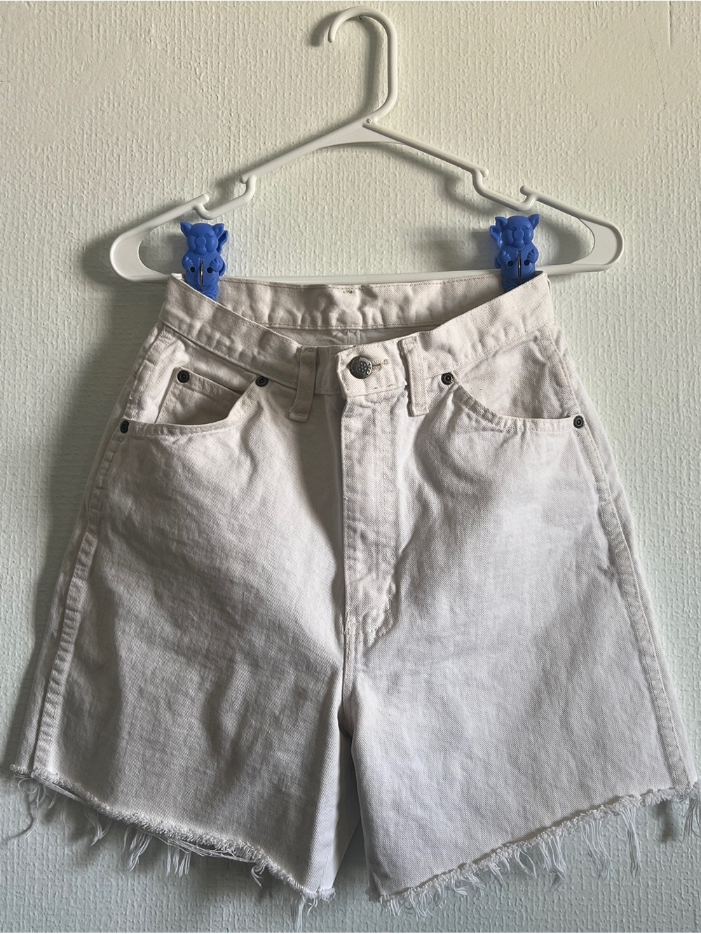 vintage white denim shorts, cutoffs with raw frayed edge, high waist